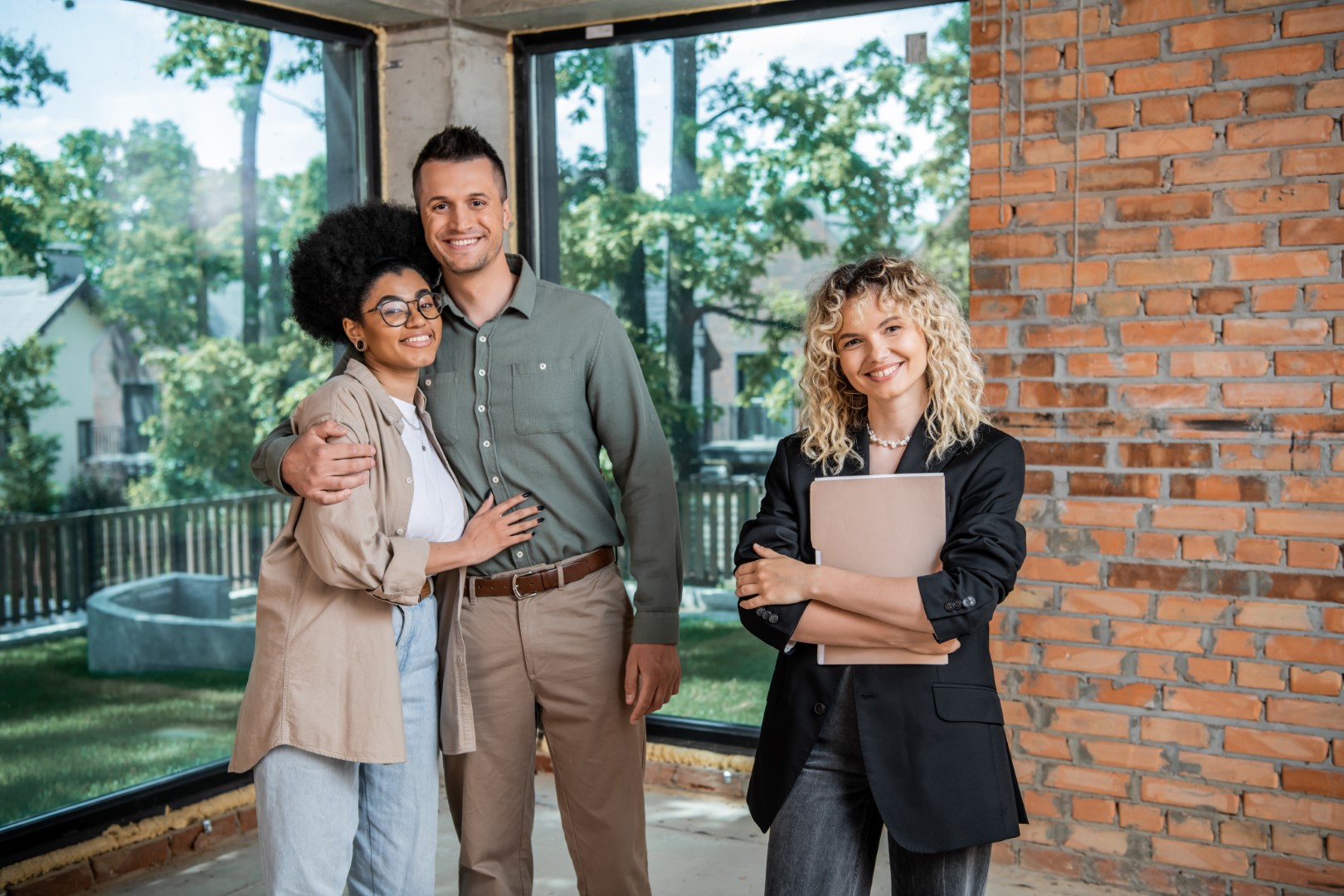 Happy couple renting an apartment through Residewell Homes
